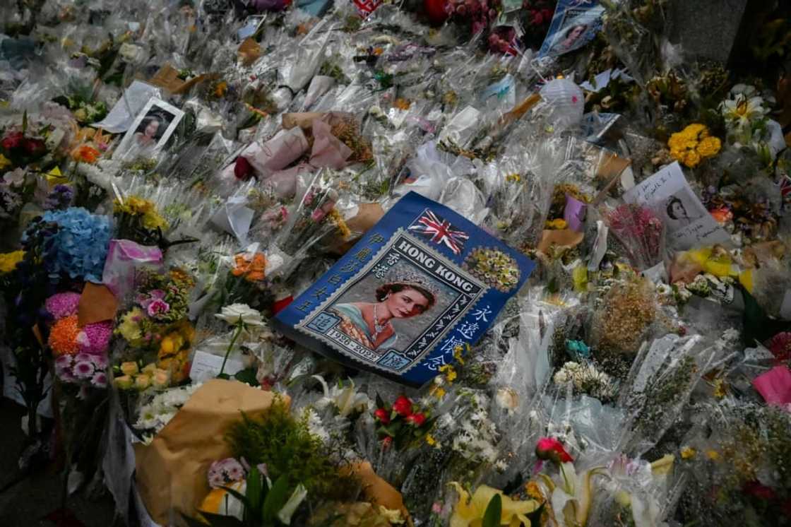 Hong Kongers have left a field of bouquets outside the British consulate Hong Kongers have left a field of bouquets outside the British consulate