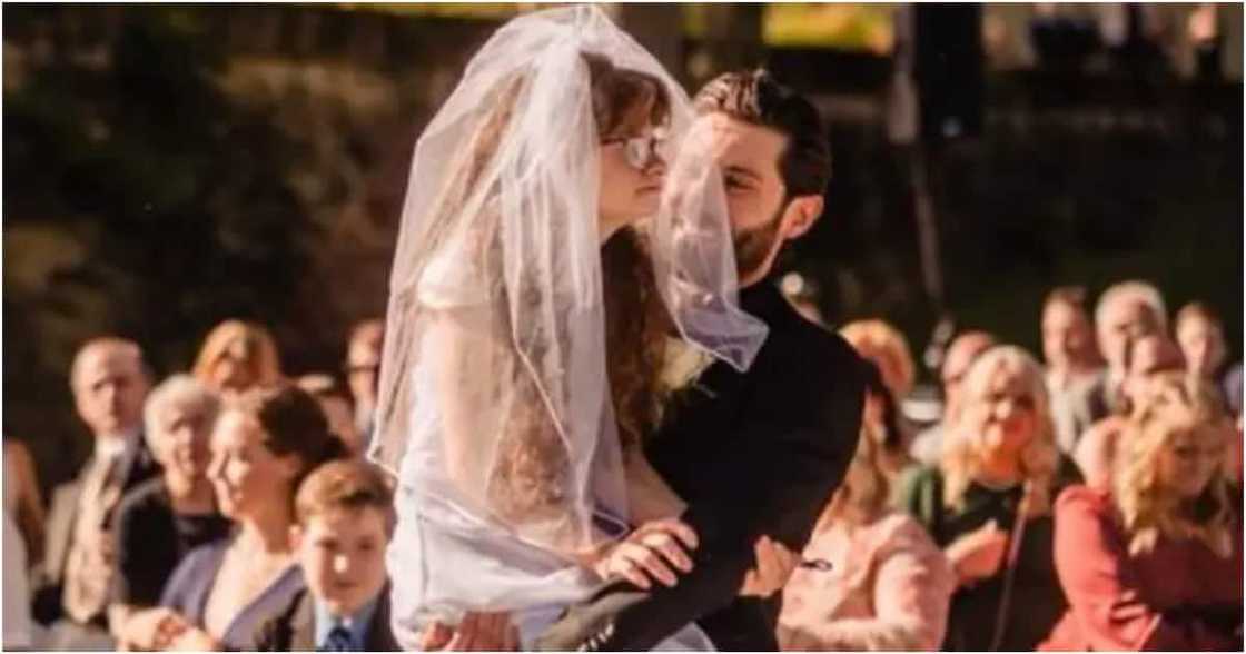 Groom Warms Hearts after Carrying Bride's disabled Twin Sister to Their Wedding Groom Warms Hearts after Carrying Bride's disabled Twin Sister to Their Wedding