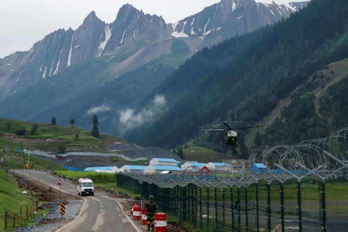 Helicopters were evacuating the dead and an unknown number of panicked and injured pilgrims from the Baltal base camp