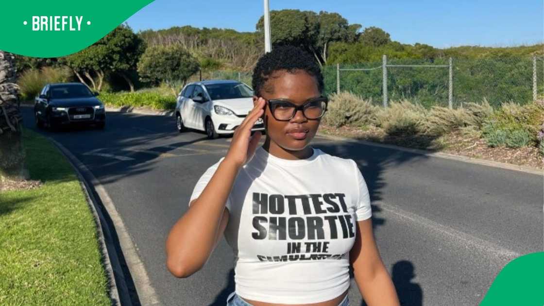 Woman standing in the road. Woman standing in the road.
