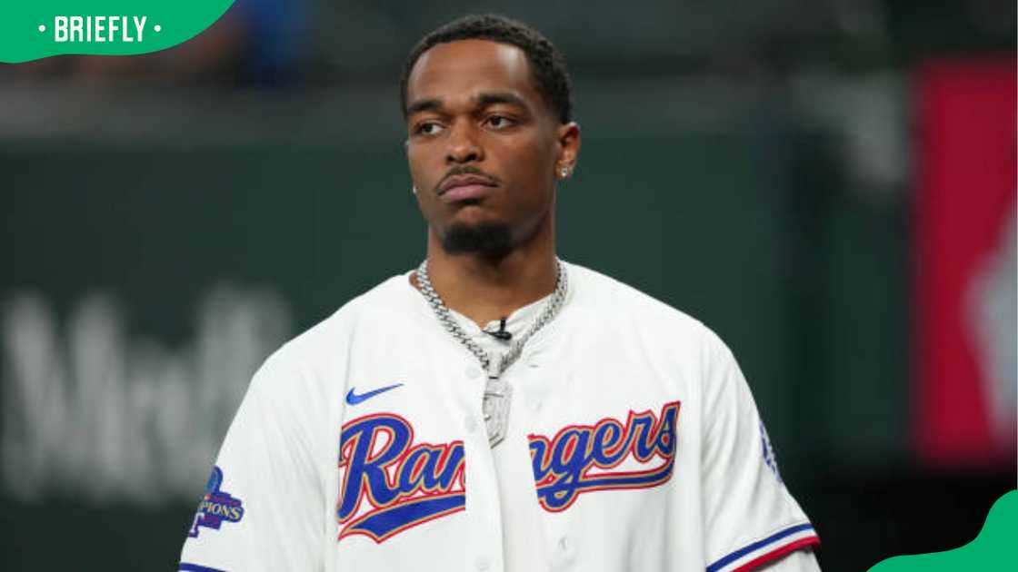 P.J. Washington of the Dallas Mavericks at the game between the Texas Rangers and the Chicago White Sox P.J. Washington of the Dallas Mavericks at the game between the Texas Rangers and the Chicago White Sox