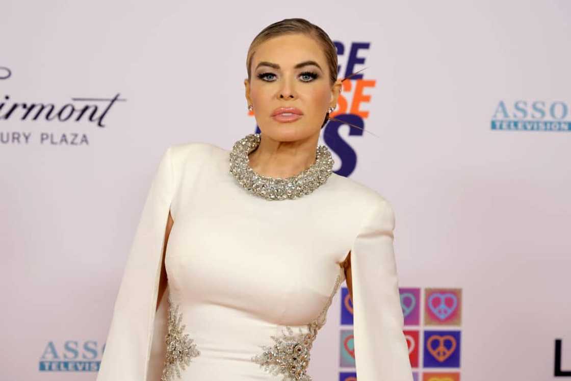 Carmen Electra in a white gown at a Race To Erase MS Gala Carmen Electra in a white gown at a Race To Erase MS Gala