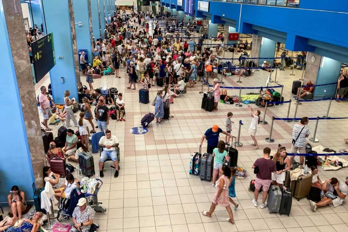 Wildfires forced the evacuations of thousands of tourists from Greek islands Wildfires forced the evacuations of thousands of tourists from Greek islands