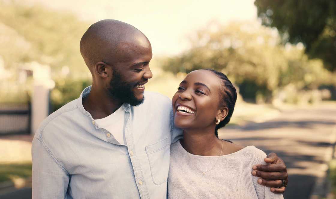 A lady and man hugging