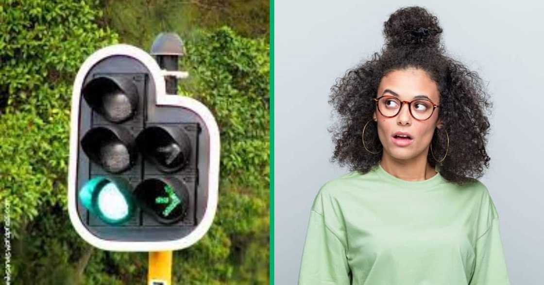 Man stealing a traffic light