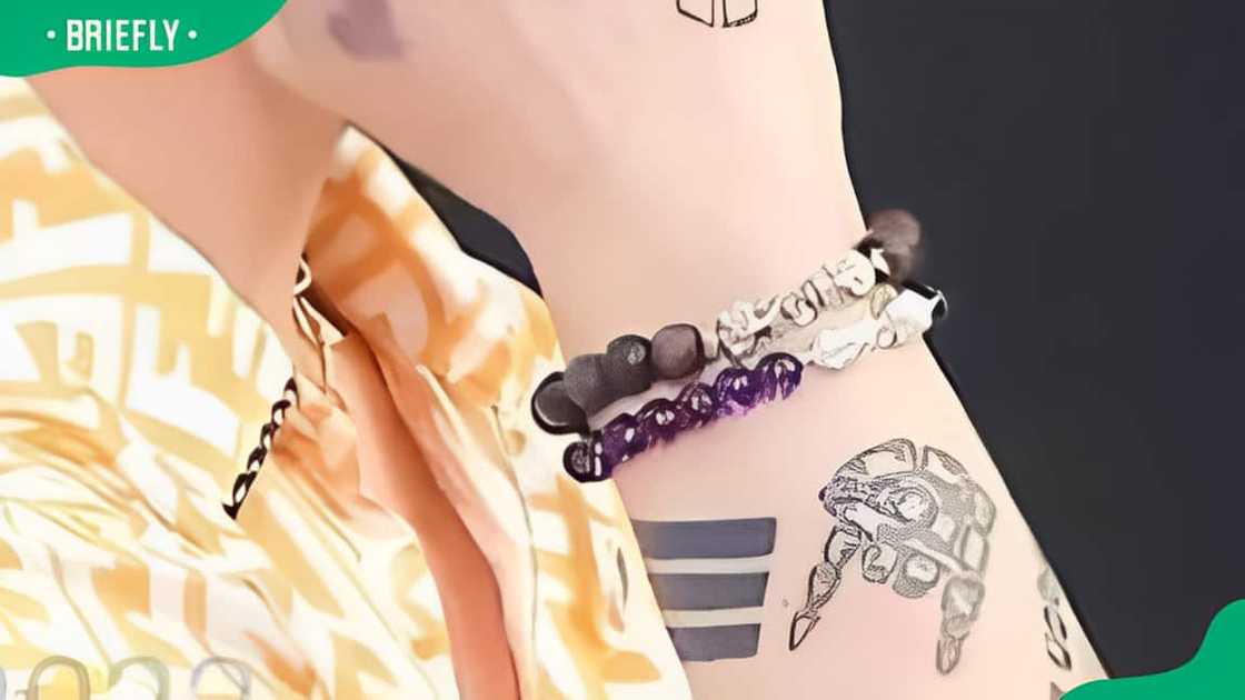 Jungkook's skeleton hand tattoo