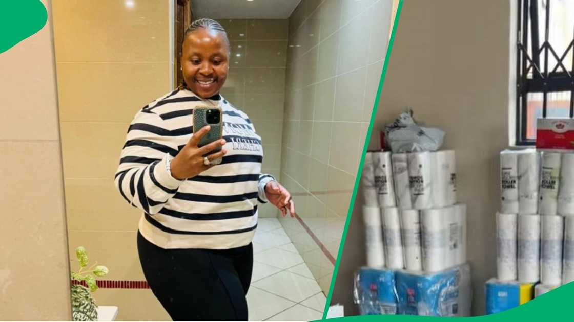 Woman shows stokvel groceries Woman shows stokvel groceries