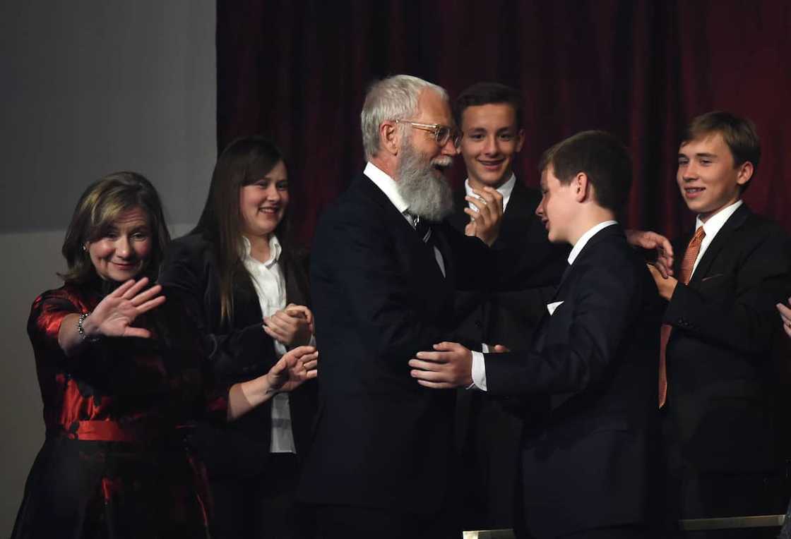 David Letterman, with wife Regina Lasko, greets his son Harry.