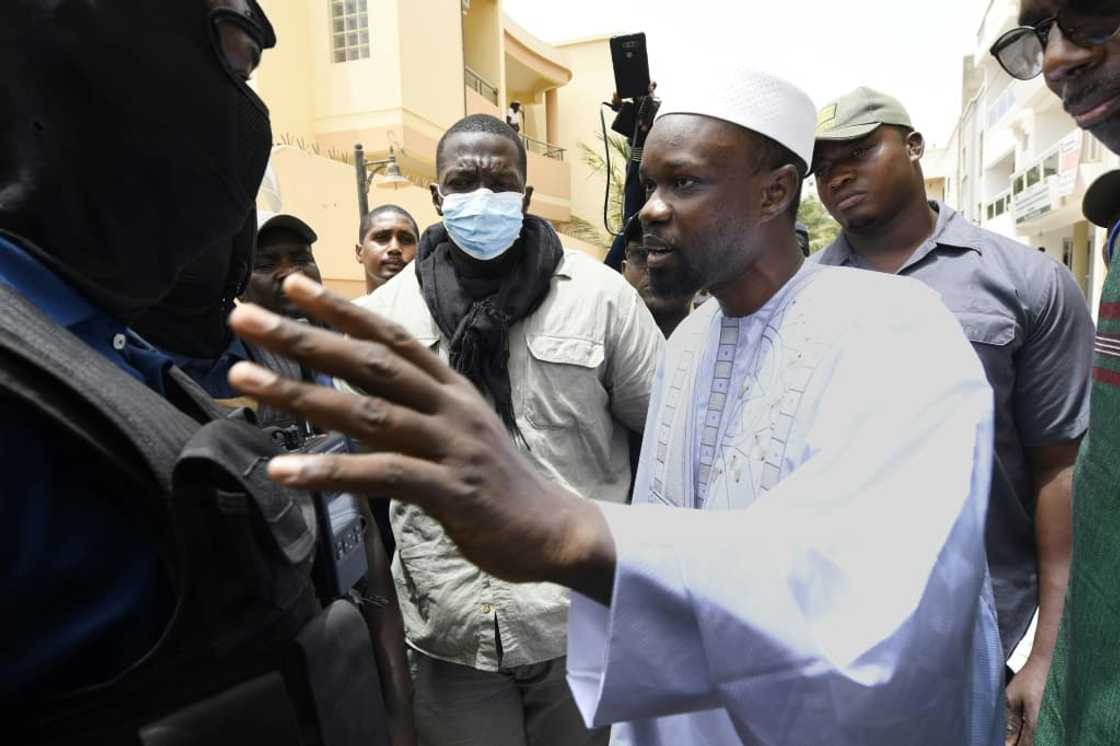 Police deployed on Friday in Dakar near the home of opposition figure Ousmane Sonko, who urged President Macky Sall to release detained opposition members Police deployed on Friday in Dakar near the home of opposition figure Ousmane Sonko, who urged President Macky Sall to release detained opposition members