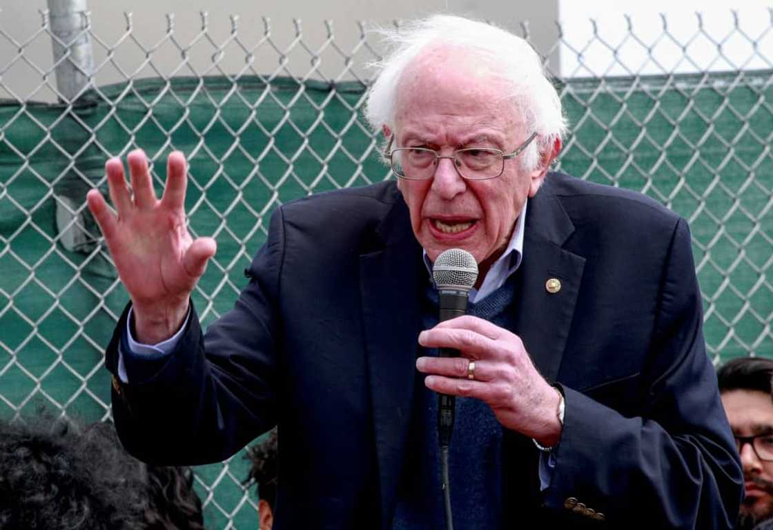 In this file photo taken on April 24, 2022, US Senator Bernie Sanders speaks with Amazon workers during a rally outside the company building in Staten Island, New York In this file photo taken on April 24, 2022, US Senator Bernie Sanders speaks with Amazon workers during a rally outside the company building in Staten Island, New York