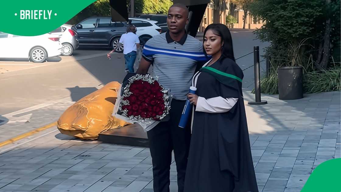 Husband and wife graduate together