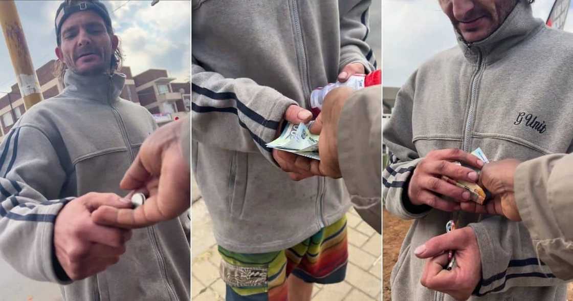 BI Phakathi giving a man looking for a job cash BI Phakathi giving a man looking for a job cash