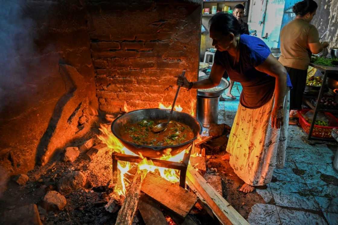 With gas prices soaring in the struggling nation, many Sri Lankans have been forced to revert to cooking with firewood