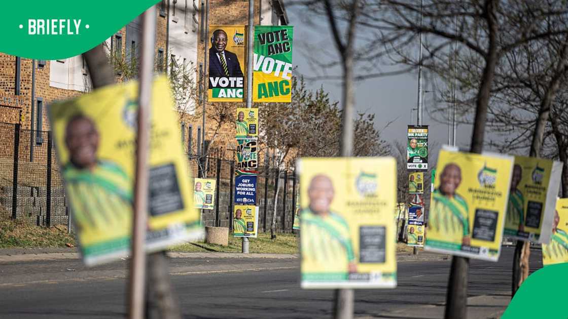 Political party banners are seen before the African National Congress's (ANC) 2026 local government election manifesto launch in Diepsloot near Johannesburg on August 23, 2026, ahead of the country's upcoming municipal elections