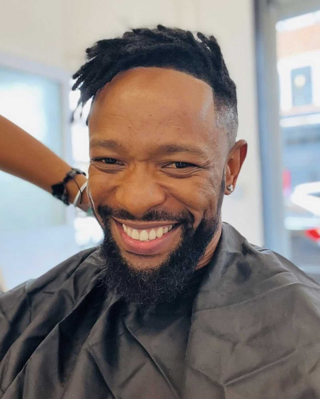Online users debated over SK Khoza's new look