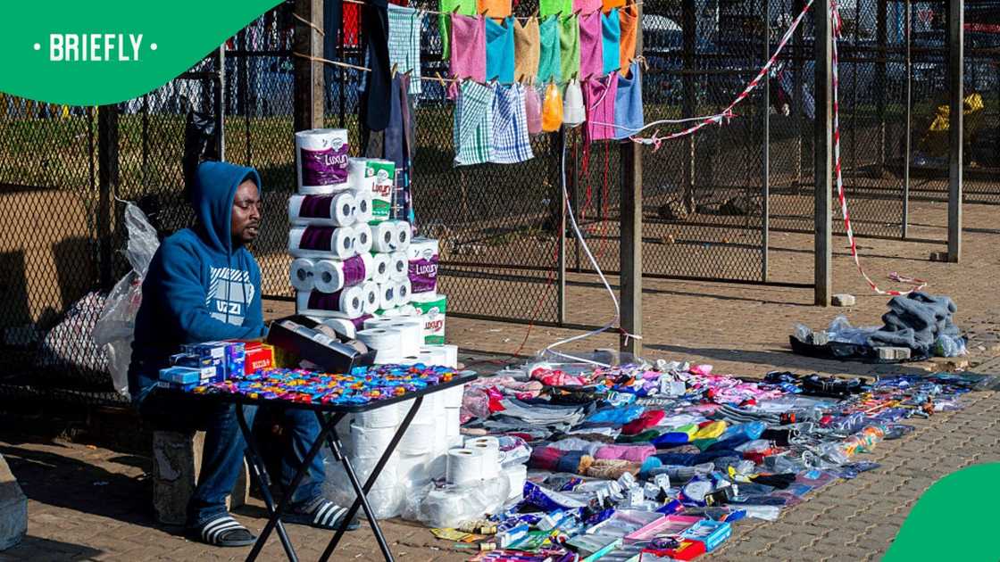 A South African trader sells his goods in an area where foreign traders were recently chased away on June 27, 2026 in Kwa-Thema outside Springs, South Africa A South African trader sells his goods in an area where foreign traders were recently chased away on June 27, 2026 in Kwa-Thema outside Springs, South Africa
