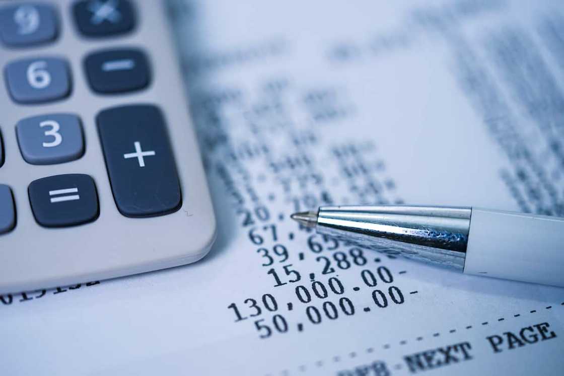 An individual doing financial statement reconciliation