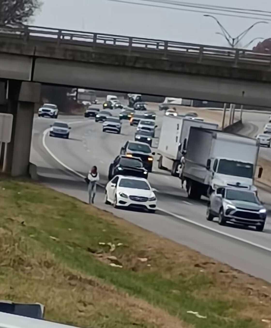 A couple's fiery traffic encounter on the highway quickly went viral.