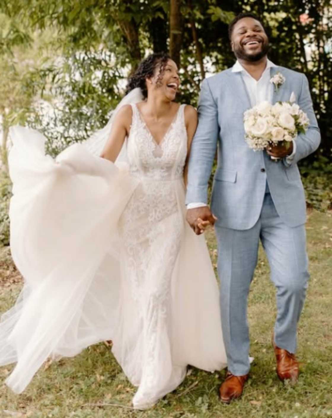 Malcolm Jamal Warner and his wife, Tenisha during their wedding