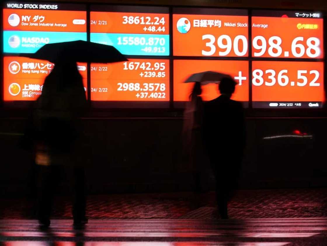 Investors celebrated on Thursday as bumper profits reported by US chip giant Nvidia helped boost Tokyo's benchmark index past a record high Investors celebrated on Thursday as bumper profits reported by US chip giant Nvidia helped boost Tokyo's benchmark index past a record high