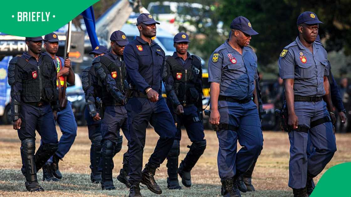 Officers in the South African Police Service (SAPS) participate in a parade at FNB Stadium on June 26, 2026 in Johannesburg, South Africa