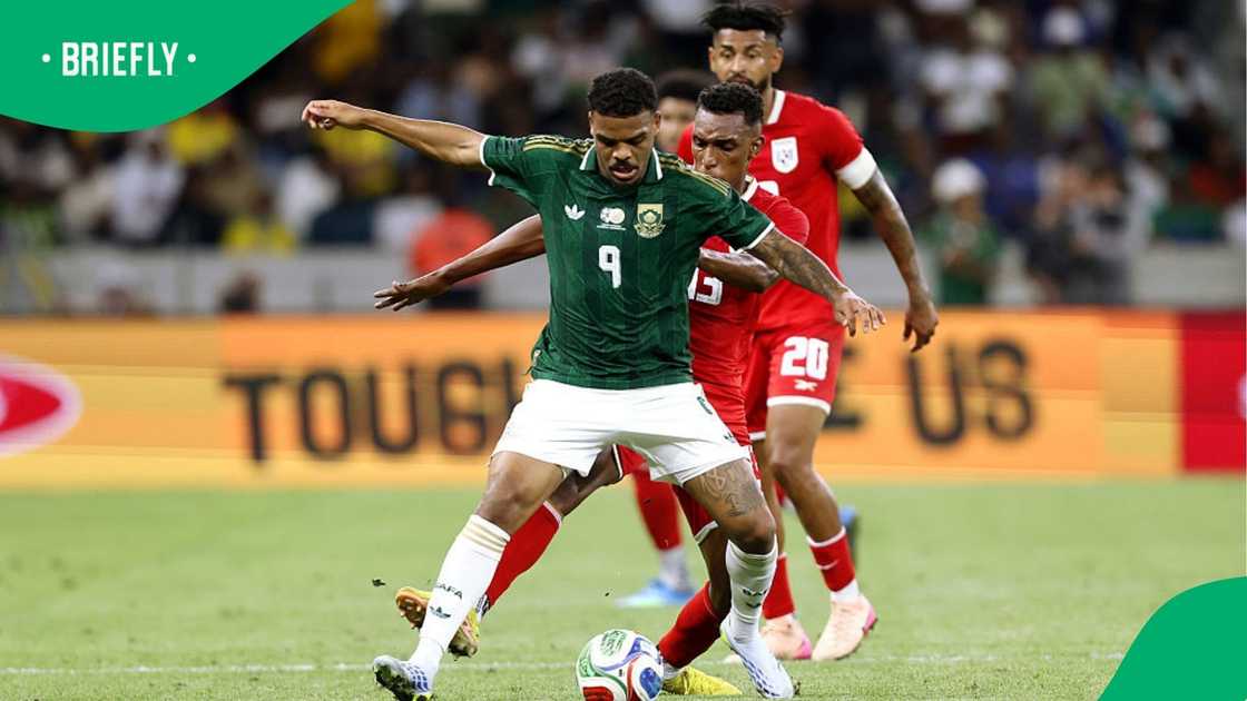Lyle Foster protects the ball from Panama Players Lyle Foster protects the ball from Panama Players