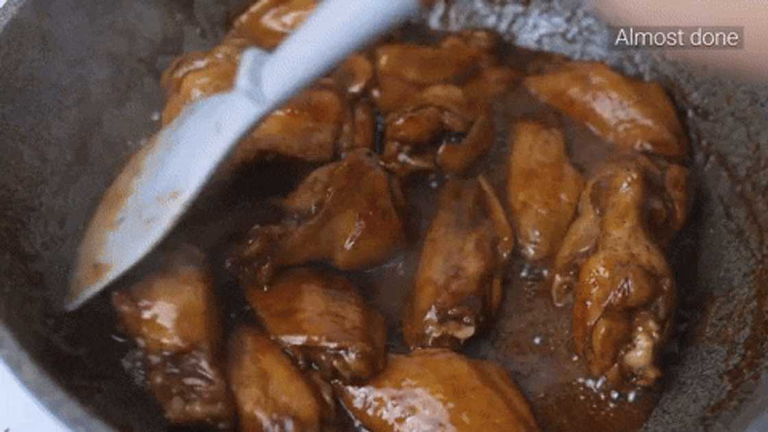 Preparing sticky chicken wings with Coke