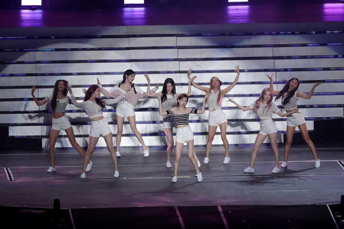 Girl group Girls' Generation performing on stage Girl group Girls' Generation performing on stage