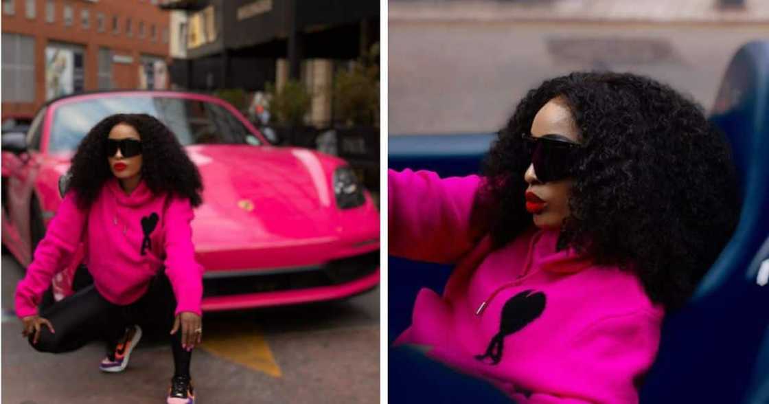 gugu khati posing in front of Porsche