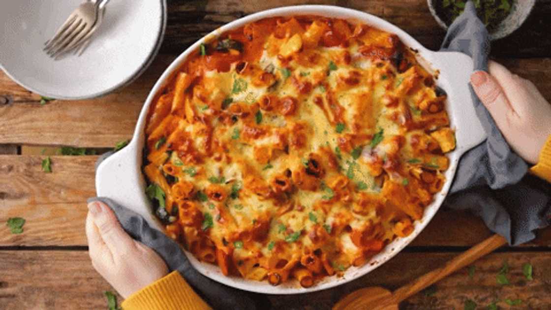 Preparing veggie pasta bake Preparing veggie pasta bake