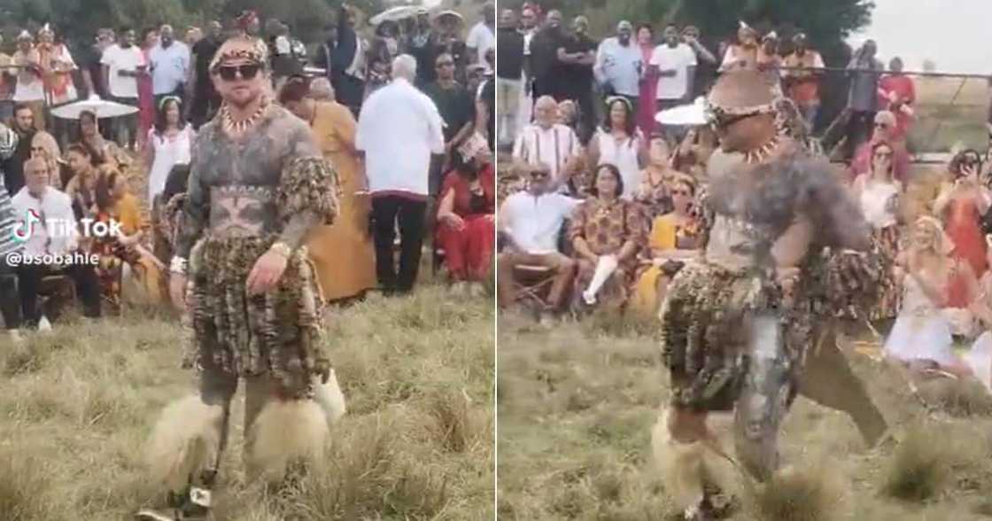 White man in Zulu attire does indlamu White man in Zulu attire does indlamu