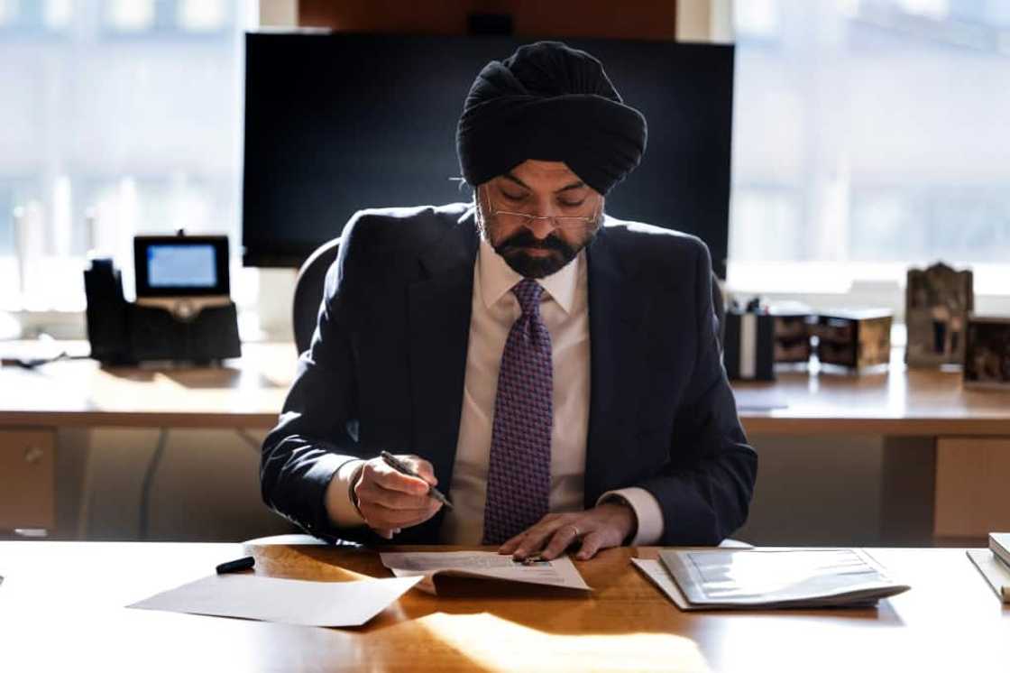 World Bank President Ajay Banga works at his desk at the World Bank headquarters in Washington, DC, on January 3, 2024 World Bank President Ajay Banga works at his desk at the World Bank headquarters in Washington, DC, on January 3, 2024