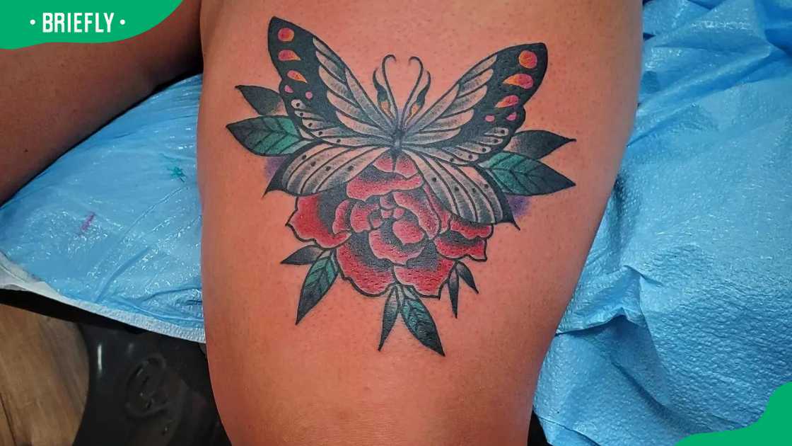 Colourful girly front thigh tattoo. Colourful girly front thigh tattoo.