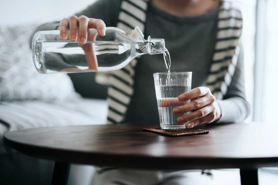 A person pouring water