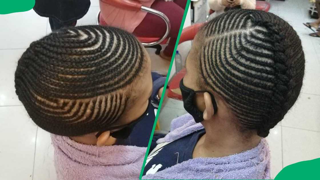 A lady with neatly done cornrows styled to the back. A lady with neatly done cornrows styled to the back.