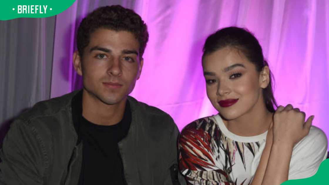 Cameron Smoller (L) and Hailee Steinfeld at an event