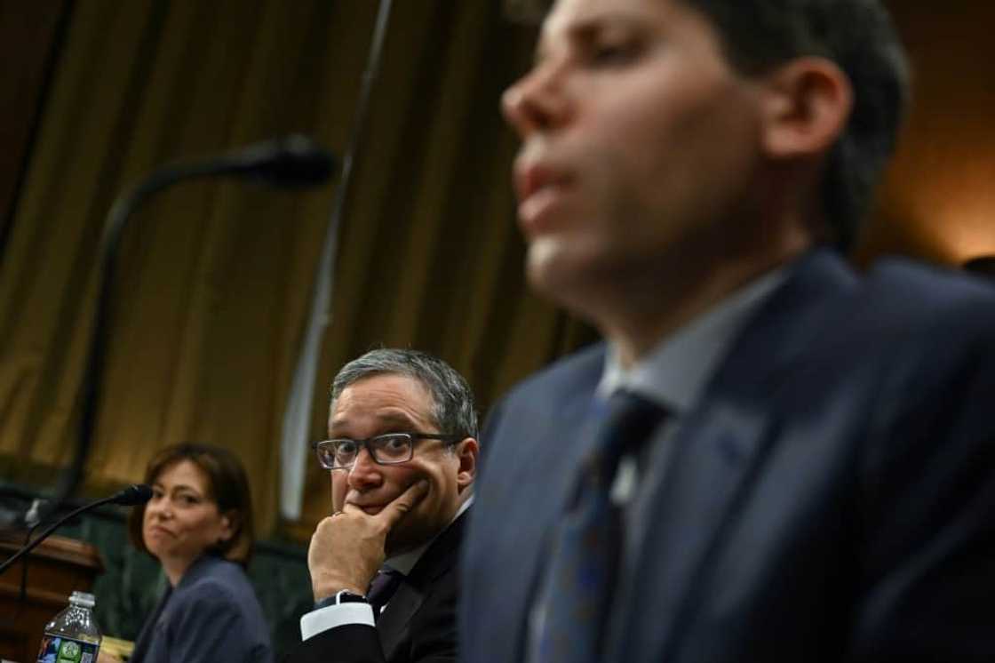 Christina Montgomery, Chief Privacy and Trust Officer at IBM, and Gary Marcus, Professor Emeritus at New York University, look on as Samuel Altman, CEO of OpenAI, testifies during a Senate Judiciary panel Christina Montgomery, Chief Privacy and Trust Officer at IBM, and Gary Marcus, Professor Emeritus at New York University, look on as Samuel Altman, CEO of OpenAI, testifies during a Senate Judiciary panel