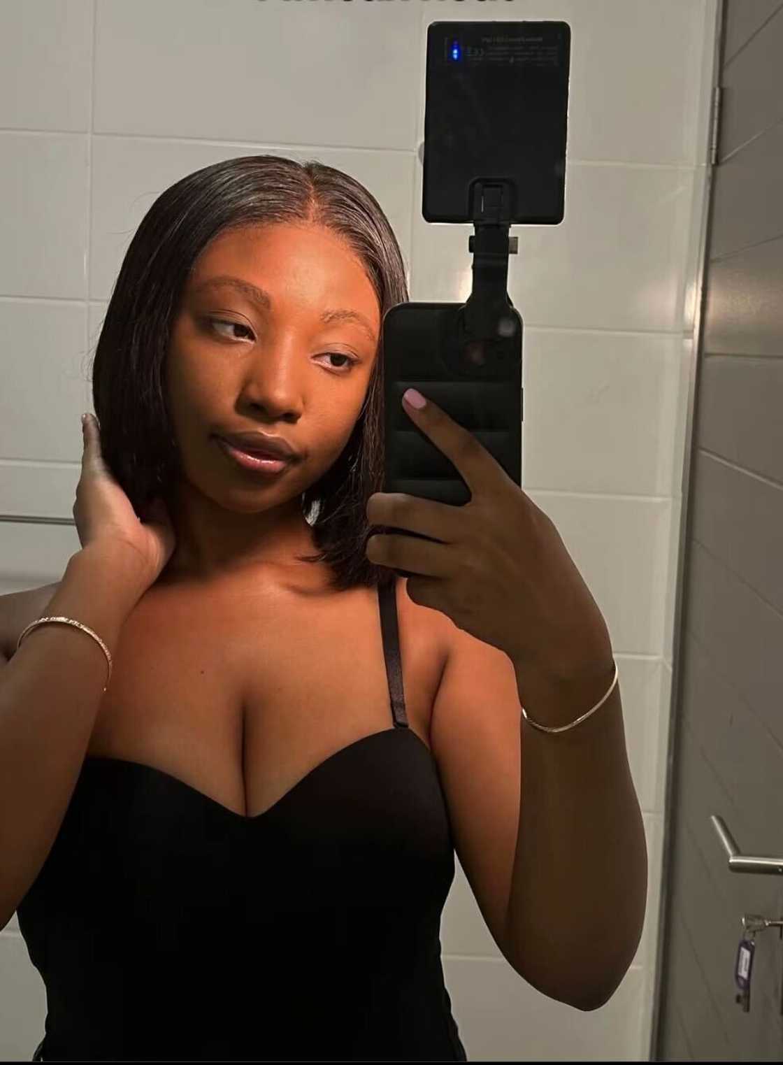 A woman caught attention with her uncanny likeness to South African actress Enhle Mbali. A woman caught attention with her uncanny likeness to South African actress Enhle Mbali.