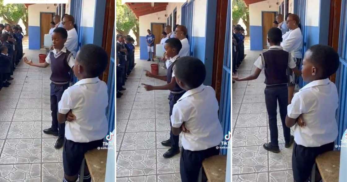 A boy praying at school assembly A boy praying at school assembly