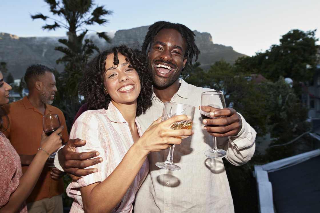 A lady and man at a birthday party A lady and man at a birthday party