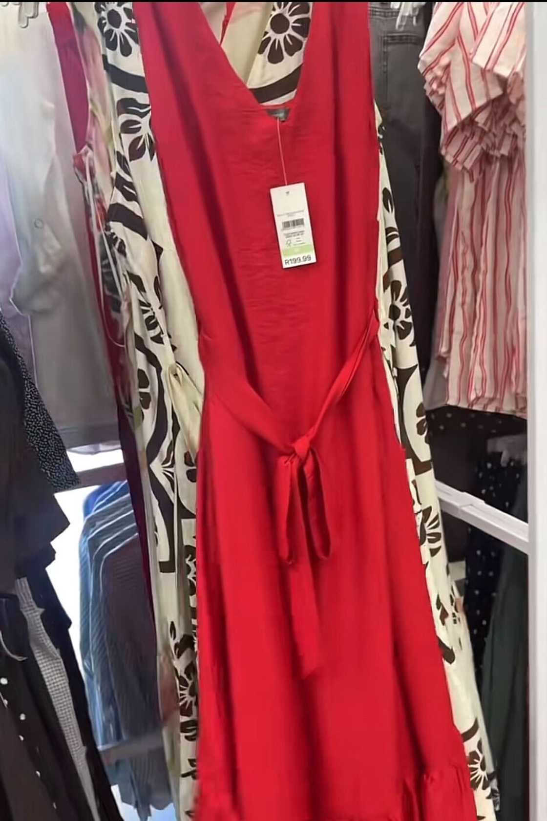 A red long summer dress from Pick n Pay Clothing, under R300, was showcased in a TikTok video.
