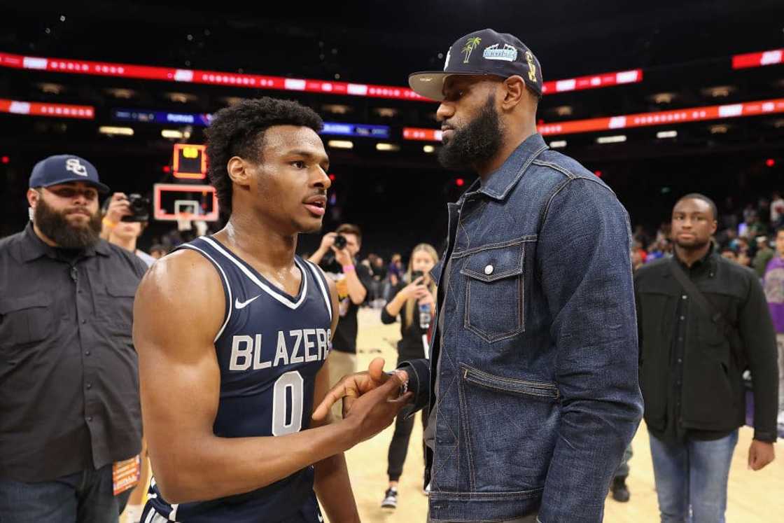 Father and son share a proud moment on the court. 
Source: Christian Petersen/Getty Images.