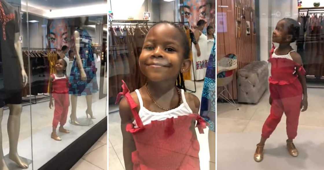 A little girl pretending to be a mannequin A little girl pretending to be a mannequin
