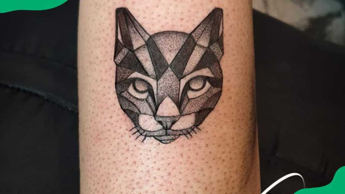 Geometric cat face tattoo Geometric cat face tattoo