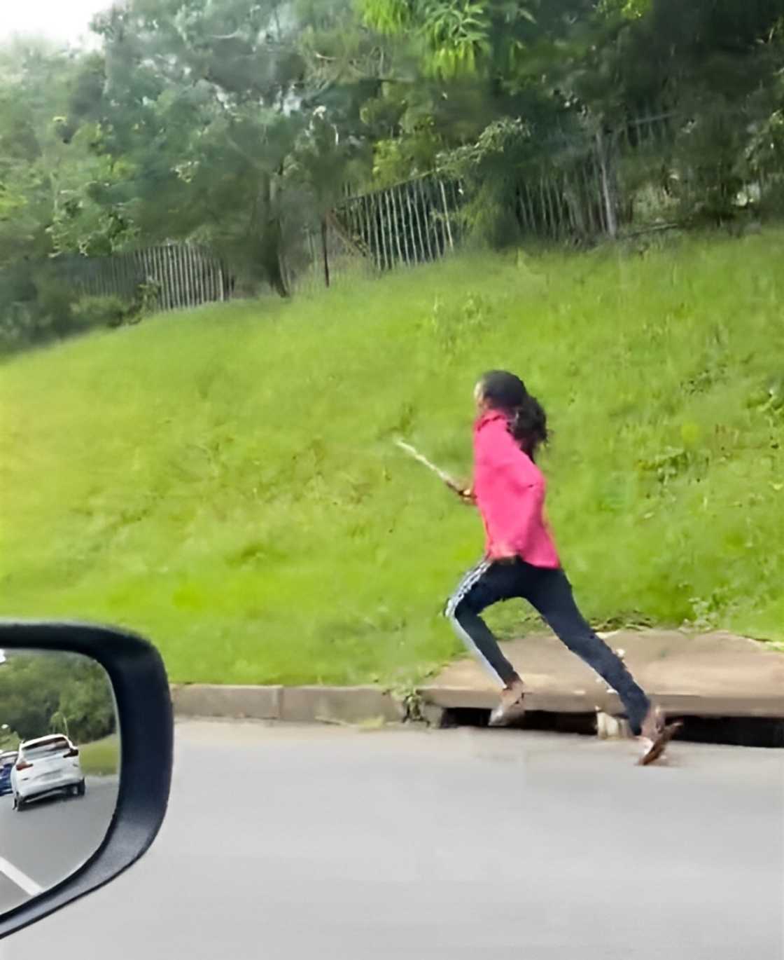 Woman shows impressive running stance while chasing man Woman shows impressive running stance while chasing man