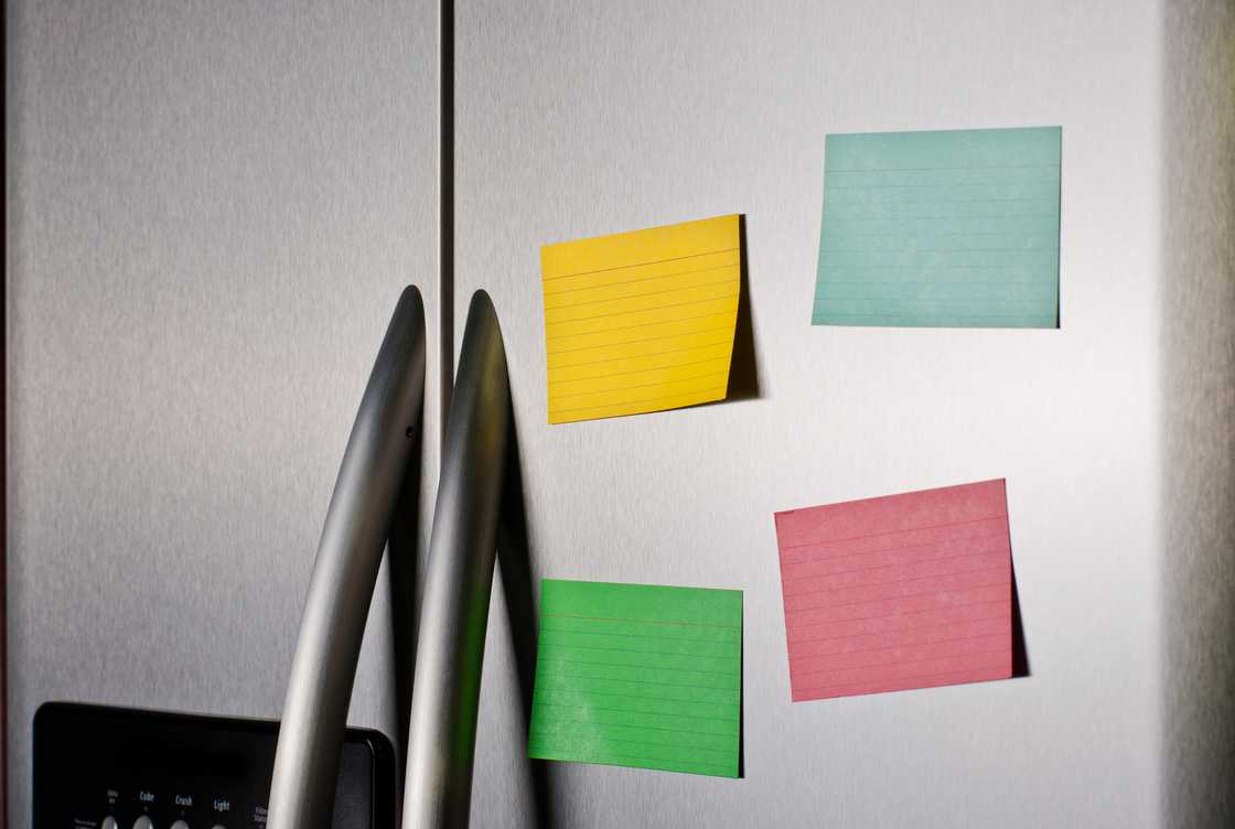 Sticky notes on a fridge