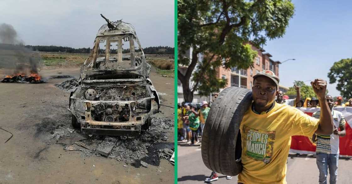 A car torched, and a protester carrying a tyre he's about to burn on the street A car torched, and a protester carrying a tyre he's about to burn on the street