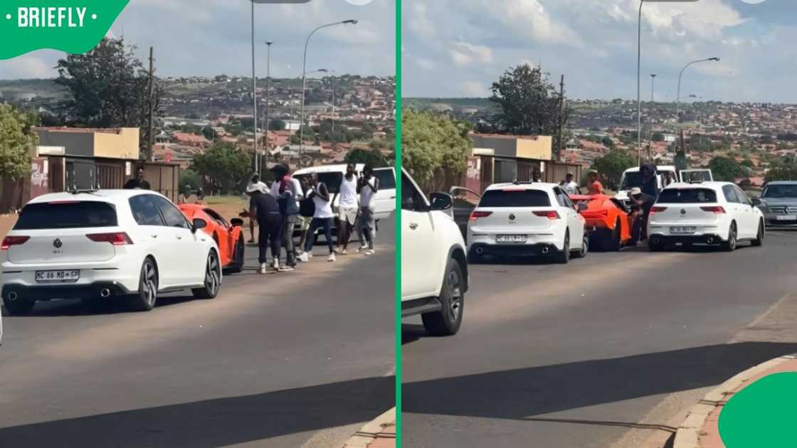 A Lamborghini drove in a township.