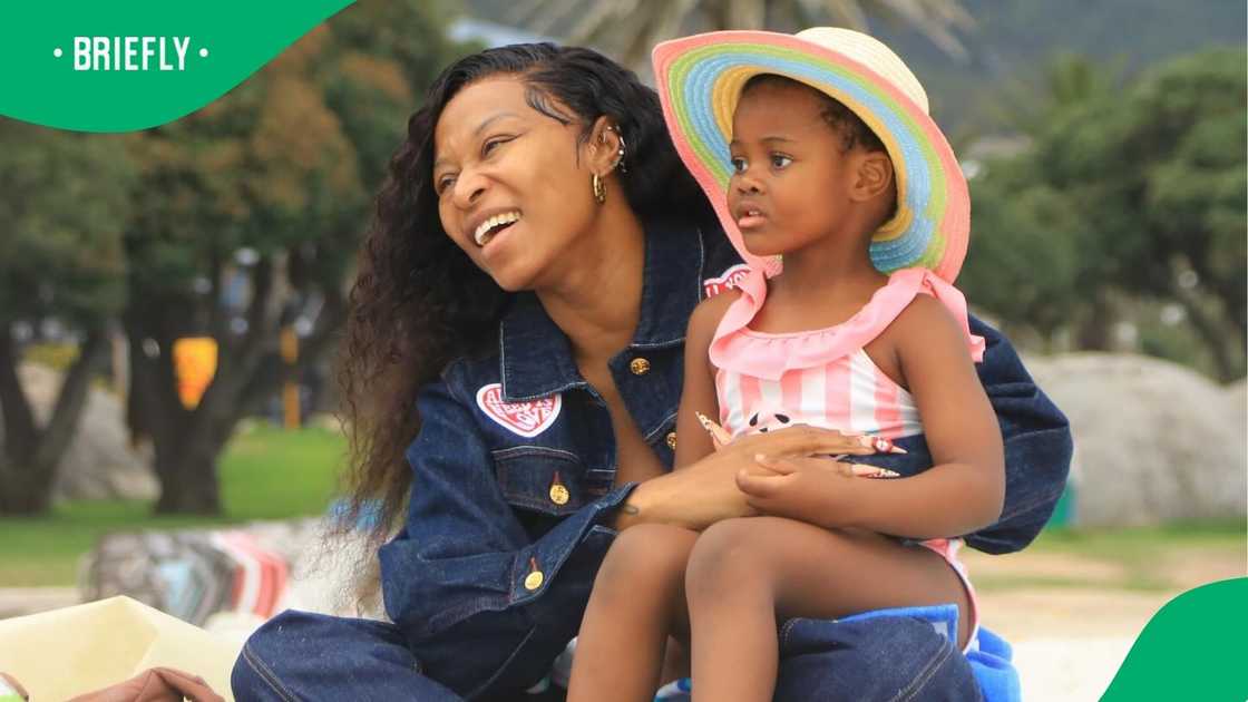 DJ Zinhle is a loving mother of two. DJ Zinhle is a loving mother of two.
