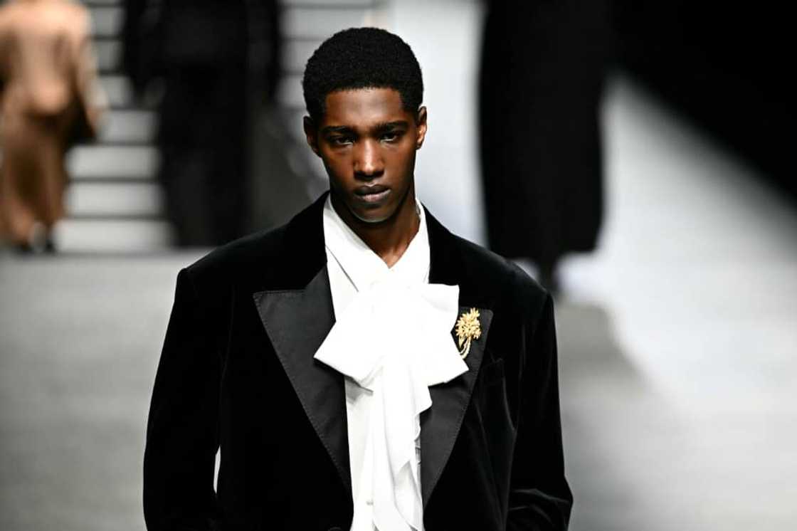 Lavalliere ties adorned razor-sharp tuxedos Lavalliere ties adorned razor-sharp tuxedos
